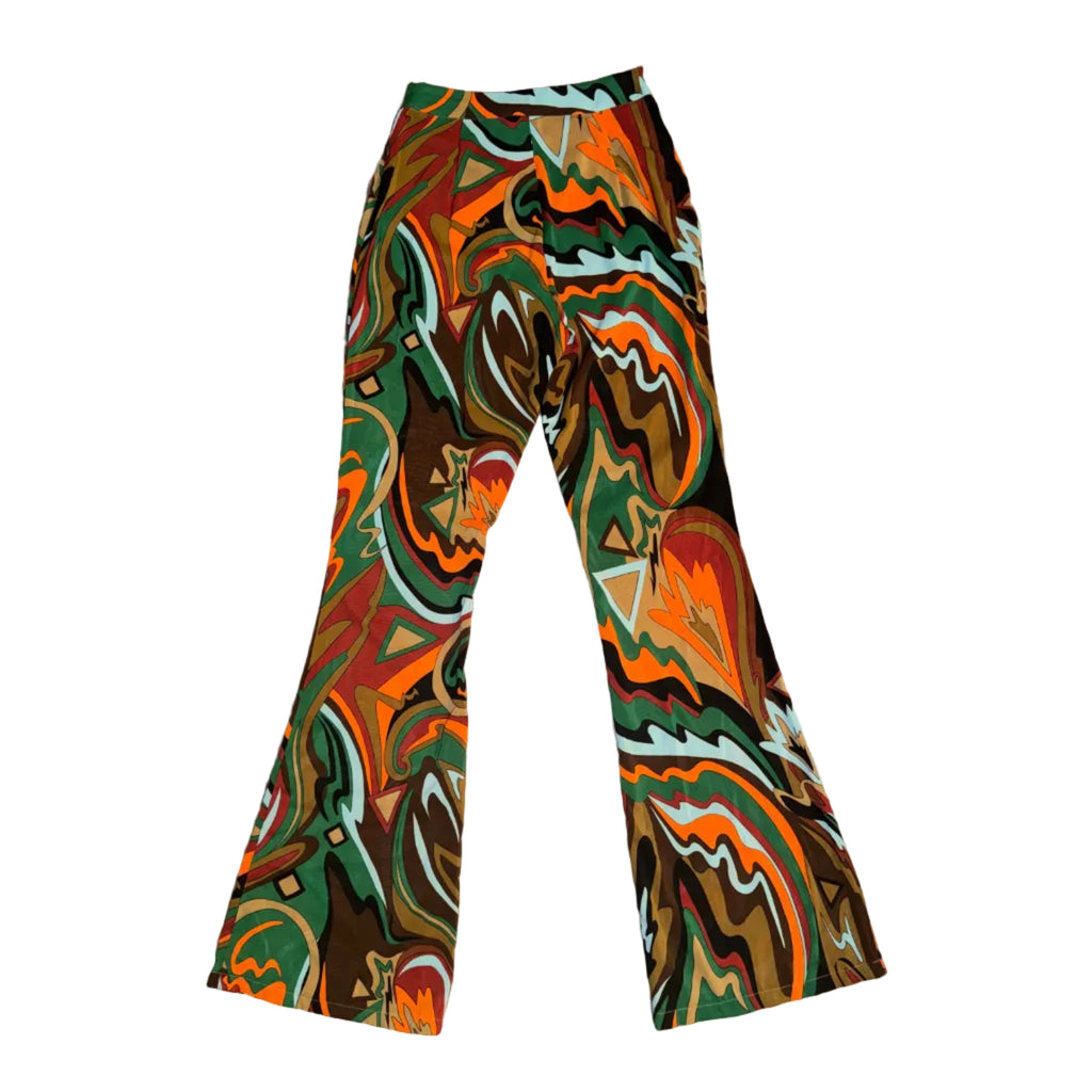 A pair of wide-leg pants with a vibrant, multicolored psychedelic swirl pattern in orange, green, brown, and white.