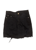 A black distressed denim mini skirt with raw frayed hems, classic five-pocket styling, and gold-tone rivets and button